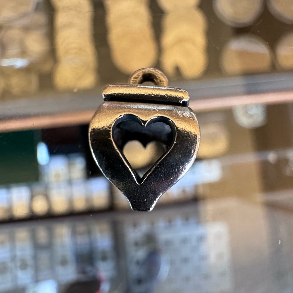 James Avery charm with cut out heart